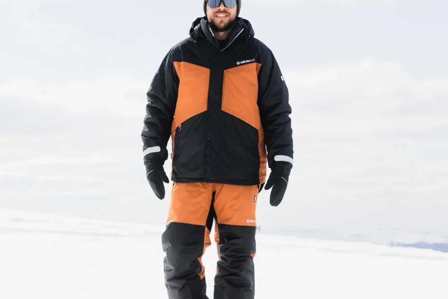 Man wearing rented winter overalls in rovaniemi